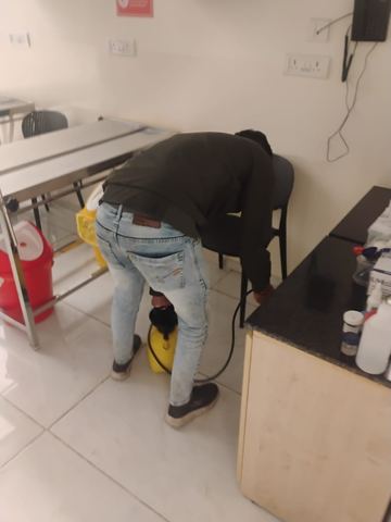 Tezz Pest Control technician carrying out a treatment at a premises in the Pune area